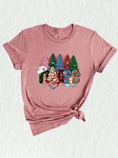 Welcome to the most festive part of our store! Your eyes have landed on our delightful nursing T-shirt, a must-have piece in every nurse's holiday wardrobe. This cute Christmas tee is not just a shirt, it's a celebration of the noble nursing profession, designed to bring holiday cheer to your workplace or Nurse Christmas Tee. Our Xmas Nurse Shirt features an adorable Stethoscope Shirt, intricately crafted to form a heart symbol. It's a fun and festive nod to your Nurse Life Shirt, designed to add a sprinkle of Christmas spirit to your daily routine. This nurse heart t-shirt comes in a range of sizes to ensure a perfect fit. As a special feature, the Stethoscope Nurse is printed with high-quality, durable ink, ensuring it remains vibrant and intact even after multiple washes. This medical C Candy Cane Shirt, Christmas Pajama Party, Snowman Shirt, Christmas Coquette, Coquette Christmas, Christmas Party Shirts, Cute Christmas Shirts, Bow Shirt, Cheer Shirts