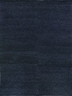 an area rug with dark blue colors