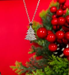 "CHRISTMAS TREE NECKLACE 🎄 -Unique Necklace -Handmade -Sterling Silver 925 -Zircon -Platinum Fill It's perfect for getting into the festive mood! Ideal for a Christmas gift to yourself or someone you love! 💕 > MATERIALS     Gold 18K,14K,12K     Sterling Silver 925  > RING SIZE    All my rings are US standard size,in case you do now know whats your ring size you could also go to your local jewelry store to measure     your finger size to get your correct ring size. Please contact me for the ring size details before placing the order.  > PACKAGING    All of our products are beautifully packaged for gifts in a jewelry box.    All of our engagement rings are packaged in PREMIUM jewelry boxes for free. > ADDITIONAL SERVICE    Engraving Service    All sizes    Costum order    > Custom Order We Christmas Jewelry Necklace, Diamond Christmas, Christmas Tree Necklace, Christmas Jewelry Gift, Christmas Presents For Her, Moissanite Engagement Ring Oval, Christmas Pendant, Necklace Diamond, Tree Necklace