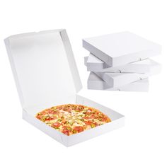 four pizza boxes are stacked on top of each other, with one slice missing from the box