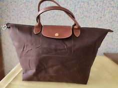 Longchamp bag Le Pliage Nylon Tote Brown,The zipper works well, there is no smell inside.Size 47cm*27cm*20cm Longchamp Bag Le Pliage, Longchamp Tote, Longchamp Bag, Year 7, Nylon Tote, Longchamp Le Pliage, Girly Things, Dream Closet, 20 Cm