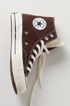 Your favorite classic Converses featured in the brand’s iconic high-top silhouette, now in a sustainable design crafted with recycled canvas materials. * Lace-up * Lined interior * Padded footbed | Chuck 70 Recycled Canvas Hi-Top Sneakers by Converse at Free People in Brown, Size: US 6.5 M Brown Converse Chuck 70, Brown Converse Aesthetic, Dark Brown Converse, Light Brown Converse, Brown Platform Converse, Converse High Tops Outfits, Hightop Platform Converse, Brown Leather Converse, High Tops Outfit