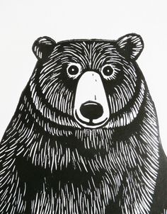 a black and white drawing of a bear