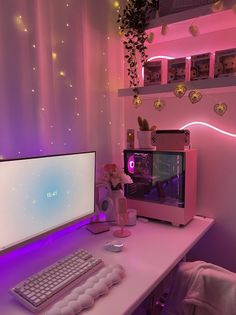 a desktop computer sitting on top of a white desk