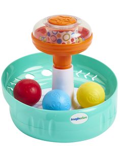 an infant's toy pool with three balls and a water sprinkler