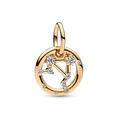 From Pandora, let the stars guide your look with the Libra Zodiac Dangle Charm. The Pandora Moments dangle charm is crafted 14k gold-plated unique metal blend, has a circular outer frame and features clear sparkling cubic zirconia as well as the shape of the Libra zodiac sign. The back side of the frame is engraved with "Libra". Creative, diplomatic and charming, the Libras in your life can always be counted on to be harmonious, expressive and sociable. Wear it as a sign of your own si Libra Charm, Libra Zodiac Sign, Wire Jewelry Rings, Charms Pandora, Wedding Day Jewelry, Zodiac Sign Libra, Pandora Style, Libra Zodiac, Pandora Bracelets