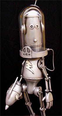 a metal robot with headphones on and arms outstretched, holding a light bulb in its hand