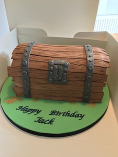 a birthday cake made to look like a trunk