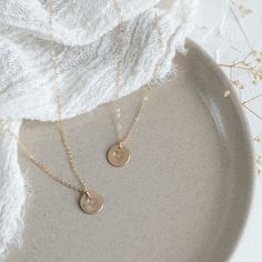 Show your sisterly love with our Sisters Necklace Set, featuring two delicate hand-stamped heart charms on adjustable chains. Available in either gold-filled or sterling silver, this set is perfect for siblings who want to share a symbol of their bond. Each charm measures 3/8 inches and is lovingly crafted with a unique heart stamp, representing the special connection between sisters. The chains can be adjusted from 16 to 18 inches, ensuring a perfect fit for both of you. For those who want a li Sister Necklace Set, Mother Daughter Necklaces Set, Sisters Necklace, Sisterly Love, Mother Daughter Necklace, Two Necklaces, Sister Necklace, Necklace Extender, Heart Stamp