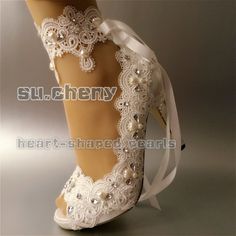 white bridal shoes with lace and pearls