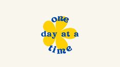 the words one day at a time written in blue and yellow on a white background