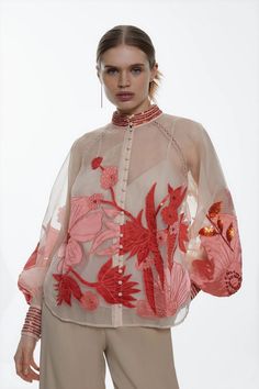 Festive Organza Blouse With Floral Embroidery, Elegant Festive Sheer Blouse, Spring Luxury Party Blouse, Luxury Spring Party Blouse, Festive Elegant Blouse With Sheer Sleeves, Luxury Long Sleeve Embellished Blouse, Festive Embroidered Organza Tops, Feminine Long Sleeve Organza Tops, Feminine Organza Blouse For Parties