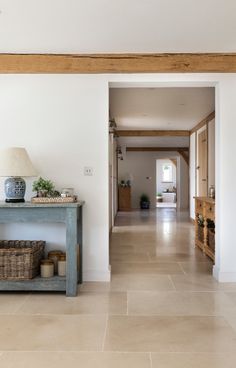 the hallway is clean and ready for us to use as an entrance way in this home