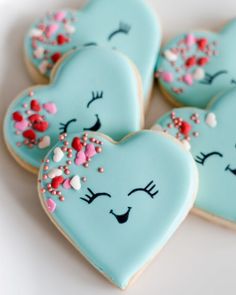 decorated cookies in the shape of heart shaped hearts