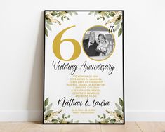 a wedding anniversary card with the number six in gold on it and an image of two people