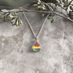 "Pansexual Necklace, Pan Flag Design Sterling Silver Necklace, LGBT Gifts Lovely described as the perfect sized pendant, this delicately subtle pride necklace is the perfect everyday jewelry to show your pride and how you identify. Make a beautifully subtle personal statement everyday! It is also the perfect gift for yourself, a partner, or dear friend. This beautiful necklace is a favorite! Don't forget that fused glass pendants really come to life in the sun too! They are like suncatchers! Nic Bisexual Jewelry, Queer Gifts, Sensory Necklace, Pan Pride, Pride Jewelry, Pride Necklace, Art Glass Jewelry, Metal Pendant Necklace, Pride Jewellery