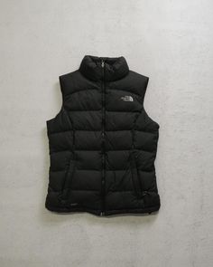 Vintage 90s The North Face Vest, Black Regular Vest, Sleeveless Vest, Insulated Vest - Women's XS Vest, Winterwear Size On Label: Women's XS  Recommended Size: Women's XS  Measurements: Pit-to-Pit: 18" Length: 25" *Minor stitching flaw and scuffing present, please check additional picture(s) for more info Northface Vest Outfit, Black North Face Puffer Jacket, Sleevless Jacket, Black North Face Puffer, North Face Puffer Vest, The North Face Vest, Sleeveless Puffer Jacket, Black Puffy Vest, Sleeveless Puffer