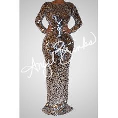 an image of a woman wearing a dress made out of shattered glass and silver foil