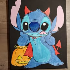 a painting of stitchy holding a jack - o - lantern on a black background