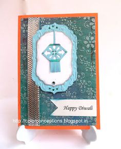 a close up of a card on a white background with a blue and orange border