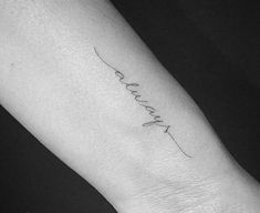 a person's arm with a tattoo that says love