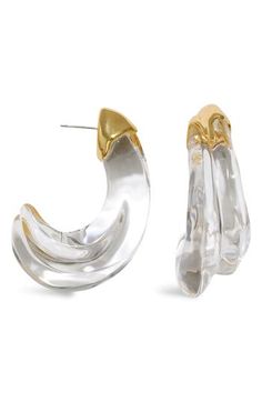 Hand-sculpted Lucite hoop earrings in a clear-liquid silhouette glimmer in the light, while the 14-karat gold-plated molten-inspired detail adds rich texture. 2" drop; 3/4" width Post back Lucite/14k-gold plate Imported Modern Clear Hoop Earrings For Pierced Ears, Modern Clear Hoop Earrings, Modern Small Hoop Clear Earrings, Modern Clear Earrings For Formal Occasions, Modern Small Hoop Jewelry In Clear, Modern Small Hoop Clear Jewelry, Modern Clear Small Hoop Jewelry, Elegant Clear Hoop Earrings, Modern Lucite Hoop Earrings