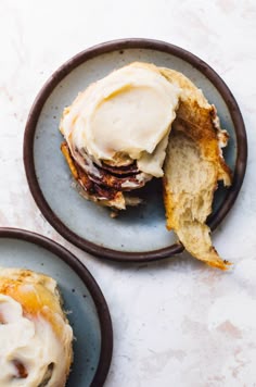 two plates that have some food on top of them and one plate has an ice cream sandwich in it