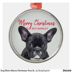 a christmas ornament with a dog's face on it and the words merry christmas our boy barkley