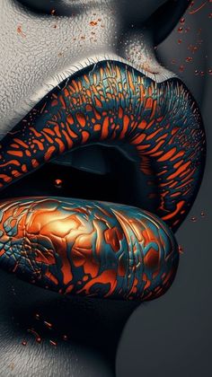 a woman's lips with orange and blue designs on them, as if they were painted