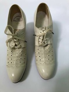 VG condition white lace-up leather granny heels /shoes with beautiful detail. Color is more bone off white than true white white. Appears to be only worn once. 2 " heel. please see measurements for proper fit as all sales are final. Marked 6 AAA. Lovely. length top of shoe 9   5/8 width 2.5 Granny Shoes, 1930s Shoes, Vintage 40s, Oxford Heels, Green Shoes, Heels Shoes, Leather Lace, White White, Beautiful Shoes