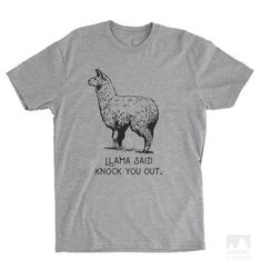 a gray t - shirt with an image of a llama saying, i am said knock