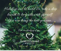 a close up of a christmas tree with a quote from lost and found on it