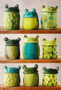 green and blue ceramic pots are lined up on the shelves in front of each other