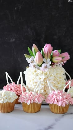 cupcakes decorated with pink and white frosting