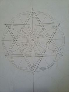 a drawing with lines and shapes in the shape of an inverted star on white paper