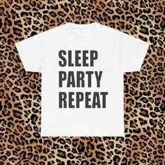 The perfect tee for you party gals out there <3 PRODUCT DETAILS :  - 100% heavy-weight organic cotton - true to size fit - tear away label - machine wash on cold / tumble dry on low heat Party T-shirt With Letter Print In Relaxed Fit, White Cotton T-shirt For Party, Graphic Tee For Party, Party Slogan Cotton T-shirt, White T-shirt With Text Print For Party, Party Cotton T-shirt With Slogan, Cotton T-shirt With Text Print For Party, Relaxed Fit Cotton T-shirt For Party, Eat Sleep Rave Repeat