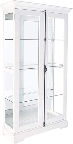 a white display case with glass doors and two shelves on each side, both closed