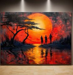 two people are standing in front of an orange sunset painting on the wall above them