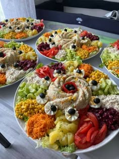 several plates filled with different types of food