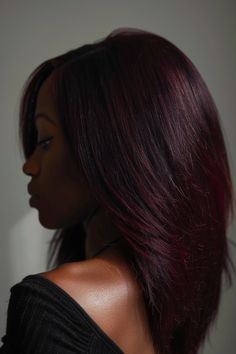 Browse our roundup of 40+ super pretty burgundy hair ideas that you'll absolutely love. From the gorgeous dark merlot hair color on a shoulder-length cut you see here to light maroon shades on long layers and bold red long bobs, you'll love all the ideas on our blog. Click to seeall of them now and save your favorites! Black Cherry Hair Black Women, Dark Cherry Short Hair, Black Cherry Hair Color Brown Skin, Cherry Chocolate Hair Color Brunettes, Burgandy Hair Highlight, Purple And Dark Brown Hair, Burgundy And Brown Hair, Maroon Hair Burgundy Wine, Dark Hair For Winter