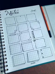 a notebook with a grid paper on top of it