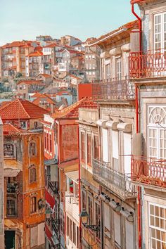 an old city with lots of buildings and balconies