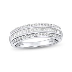 Add sparkle to all your favorite looks when you wear this baguette-cut and round diamond triple-row ring in sterling silver. Crafted in sterling silver Channel-set baguette-cut diamonds shimmer between polished and diamond-lined borders. This triple-row ring captivates with 1/2 ct. t.w. of diamonds. This ring is available in size 7 only. Silver Baguette Ring Fine Jewelry, Silver Baguette Diamond Rings, Baguette Cut Diamond, Channel Set, Baguette Cut, Round Diamond, Round Diamonds, The Row, Borders