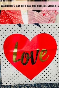 valentine's day gift bag for college students with the word love painted on it