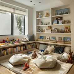 a child's room with bookshelves and stuffed animals on the rugs