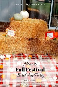 hay bale with pumpkins and candles on it for a fall festival birthday party