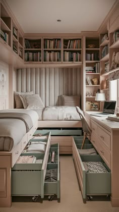 a bed room with a neatly made bed and lots of drawers