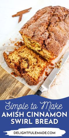 a loaf of cinnamon swirl bread sitting on top of a cutting board