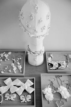 a table topped with different types of jewelry