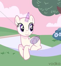 a little pony that is flying through the air with a kite in it's mouth